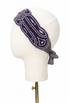Plum silk bandeau headband with beaded Patou logo and side bow