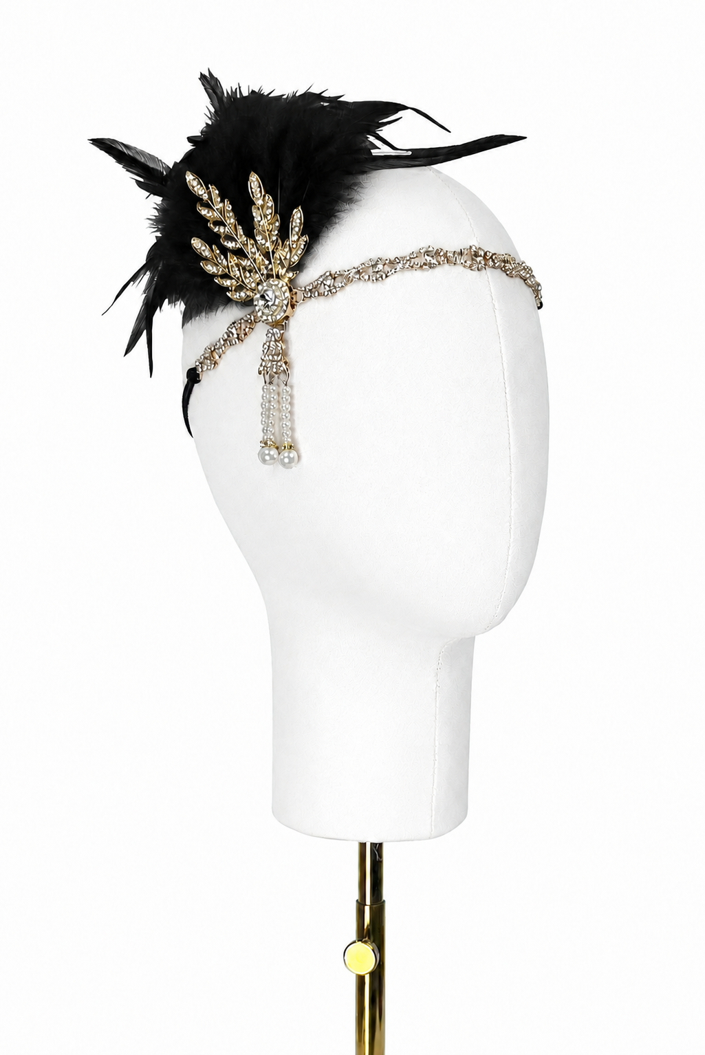Black feather headband with gold jeweled centerpiece and chain detail