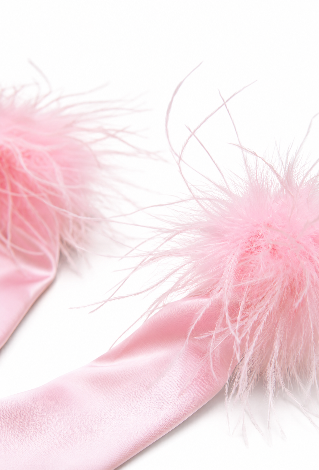 Rose satin opera glove close-up with fluffy feather cuff trim