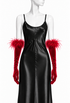 Red velvet opera gloves with fluffy feather cuffs worn at the wrist