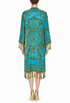 Silk velvet kimono back view in teal with ornate center medallion and fringe tassel hem