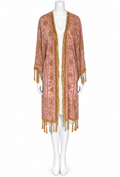 Rose-gold silk kimono with open front, wide sleeves, ornate print, tassel fringe trim