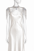 White satin evening dress with palladium-tone crystal shoulder collar and chain fringe