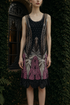 Sleeveless noir gown with rose-pink patterned hem and ornate beadwork