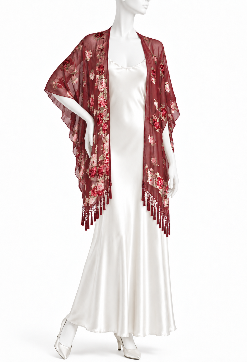 Bordeaux silk wrap with floral print and long fringe trim draped over shoulders