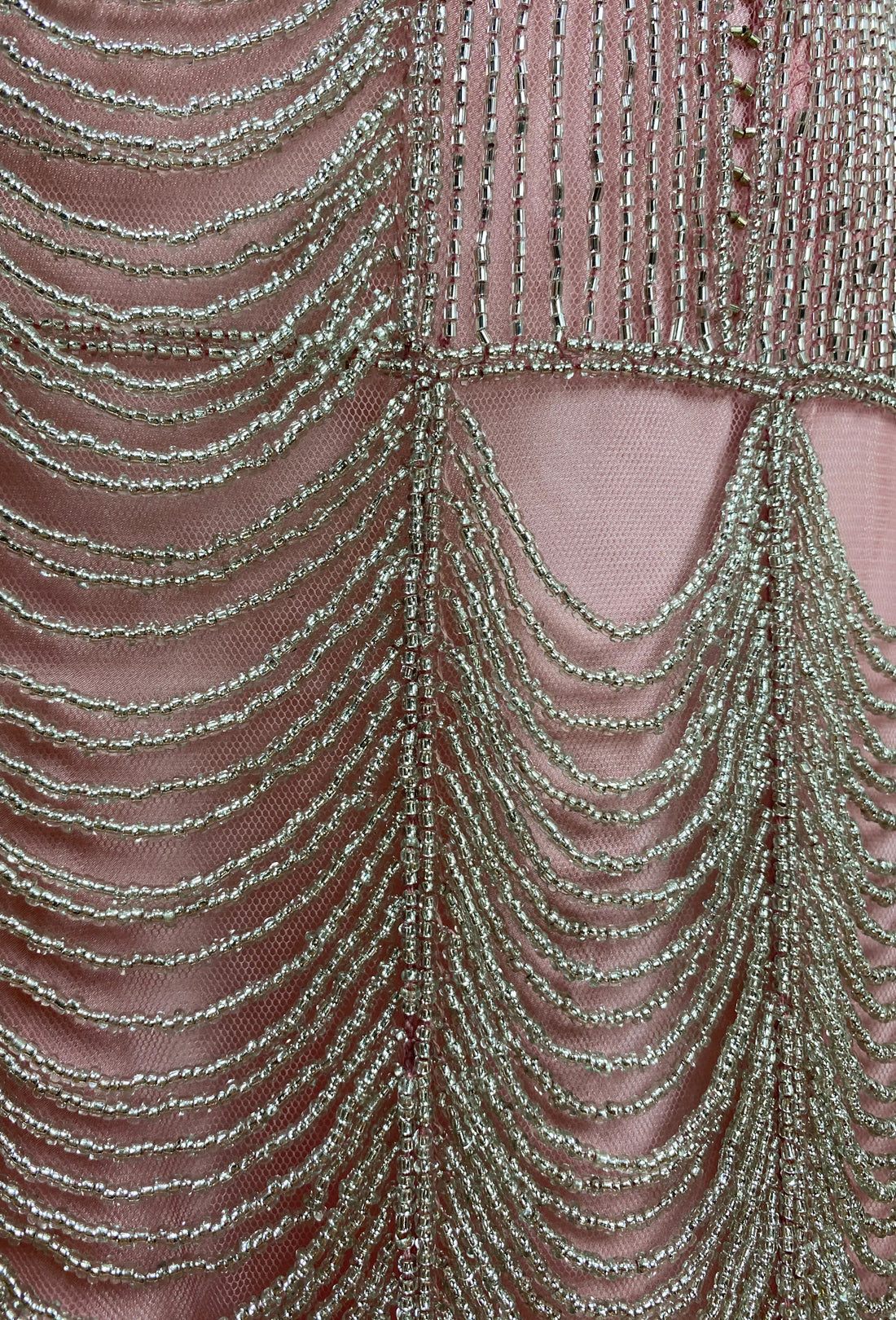 Rose-pink sleeveless beaded shift dress with layered chain fringe detailing