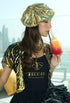 Black cotton jersey T-shirt with gold bow logo and Hollywood text, worn by model